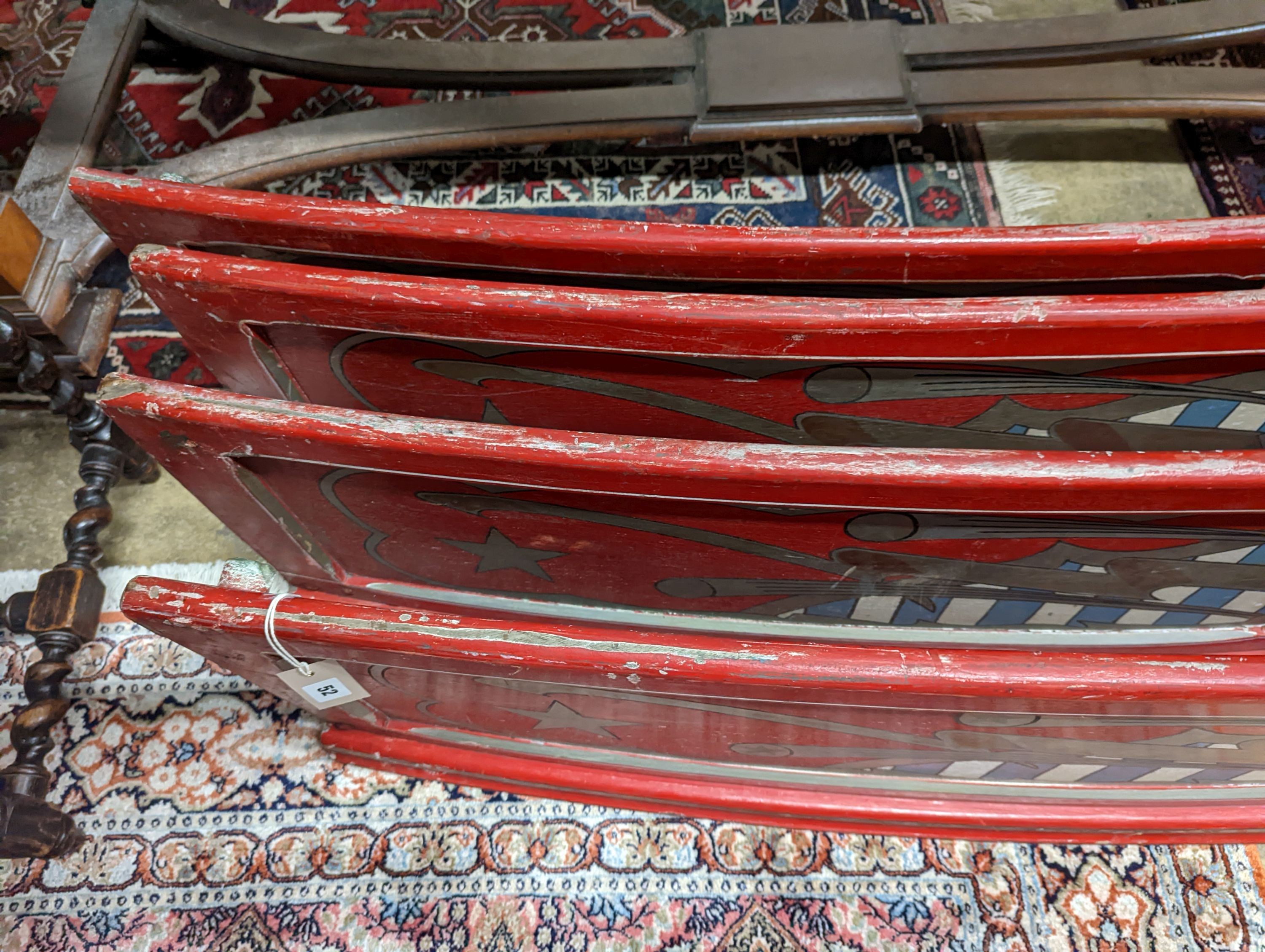 Four vintage painted fairground boards. Length-183cm, Height-39cm.